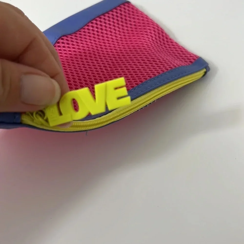 NWOT Pink Blue‎ and Yellow Mesh Makeup Bag